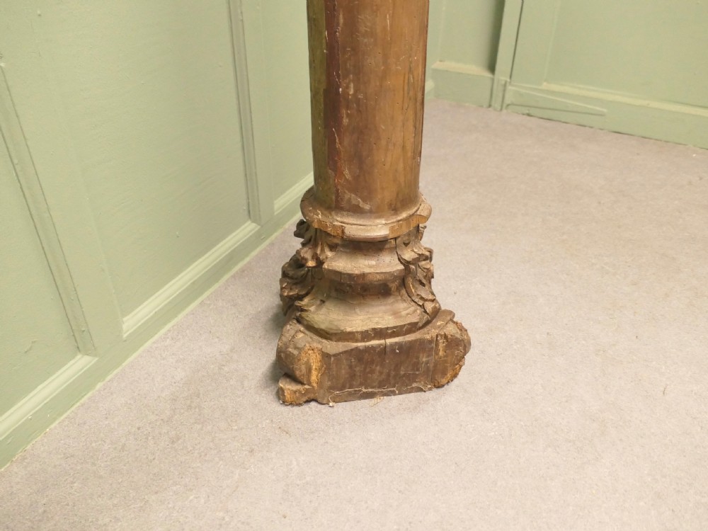 A tall, carved giltwood Corinthian column pedestal featuring a fluted shaft, acanthus leaf capital, and decorative base. View VIII