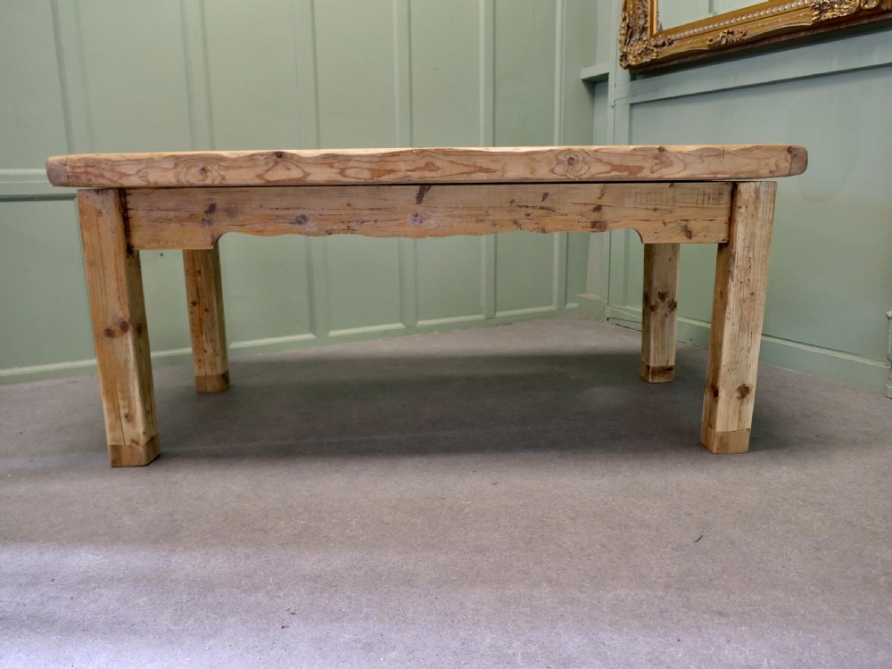A rustic Victorian scrubbed pine kitchen table featuring a thick plank top and solid square-section legs. View IV
