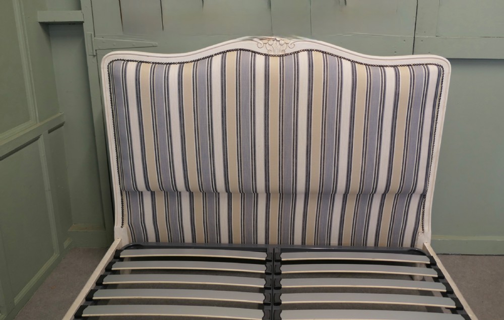 A French Louis XV style double bed featuring a cream painted carved wooden frame and grey striped upholstered headboard and footboard. View III