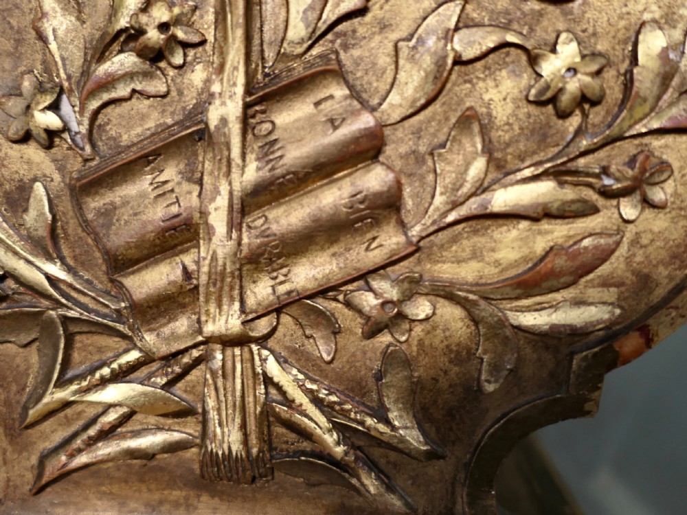 A gilded wooden two-tier book trough featuring spiral legs, carved cresting, and purple velvet lining. View VII