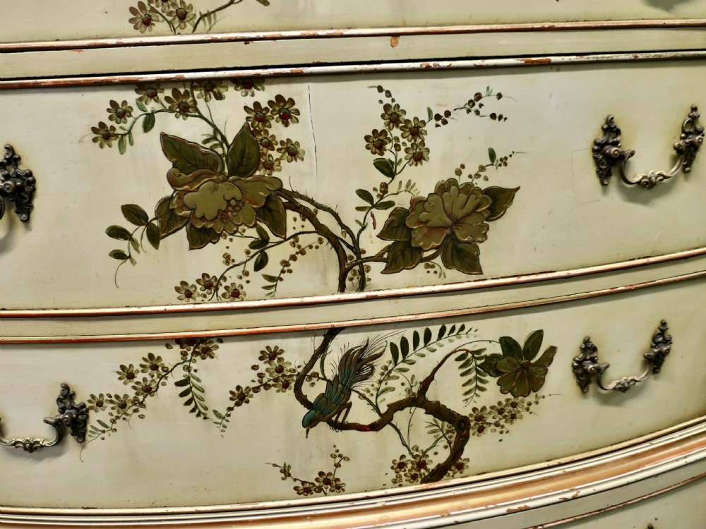 A cream-painted tallboy chest on chest featuring hand-painted Chinoiserie botanical motifs across six drawers with brass bail handles. View III