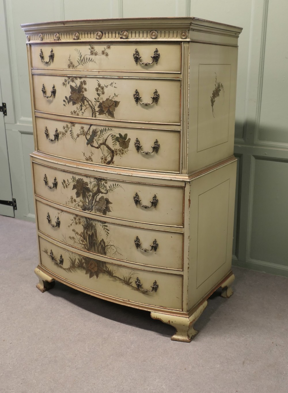 A cream-painted tallboy chest on chest featuring hand-painted Chinoiserie botanical motifs across six drawers with brass bail handles. View IV