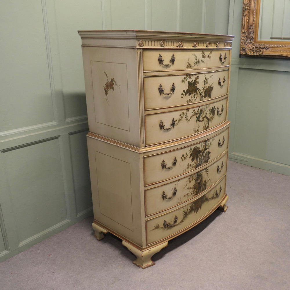A cream-painted tallboy chest on chest featuring hand-painted Chinoiserie botanical motifs across six drawers with brass bail handles. View VI