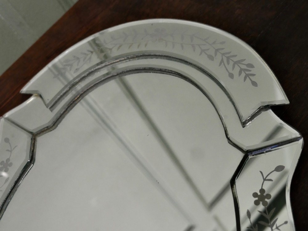 An Art Deco shaped mirrored glass tray featuring etched floral motifs and bevelled cut-glass borders. View IV