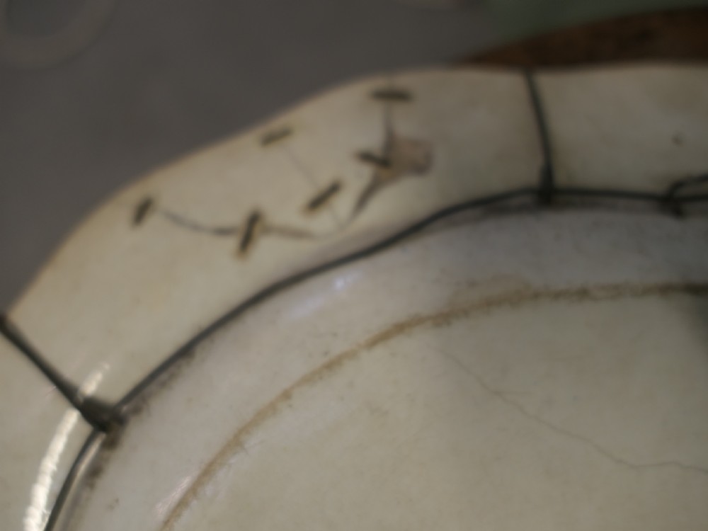 Pair of early nineteenth-century oval earthenware chargers featuring blue and white printed landscape and maritime motifs. View XI
