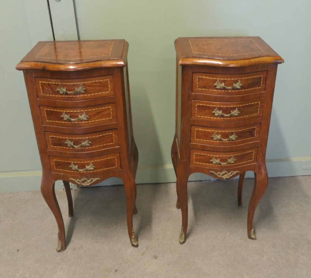 A Pair of Tall French Four Drawer Ormolu Side Lockers