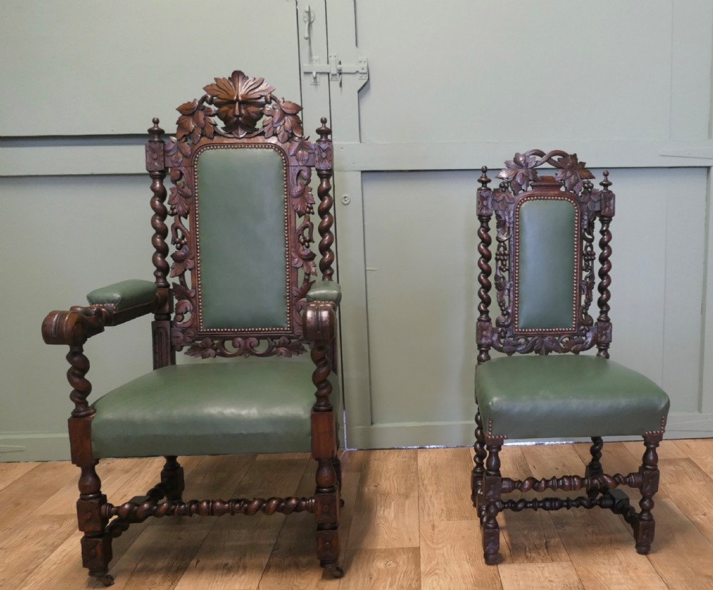 A set of ten carved oak dining chairs featuring green leather upholstery, barley twist legs, and detailed crest rails, comprising two carver armchairs and eight side chairs. View III