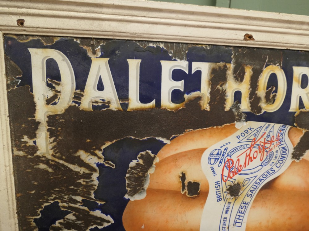 A framed antique blue and white enamel advertising sign for Palethorpes Royal Cambridge sausages featuring a central pictorial illustration. View III