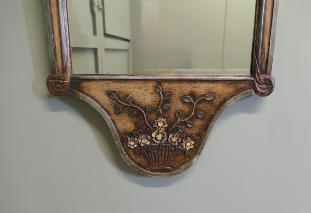 A 19th-century Northern Italian Baroque style wall mirror featuring a carved wooden frame with a scallop shell crest and polychrome floral carvings. View II