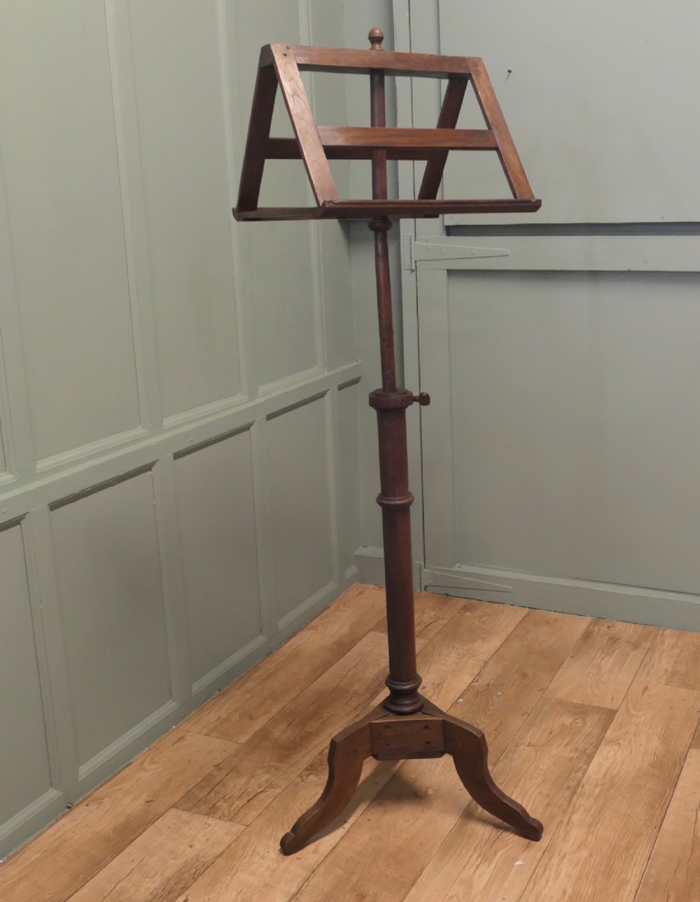 A 19th-century oak duet music stand featuring a double-sided adjustable rack resting on a turned column and tripod base. View III