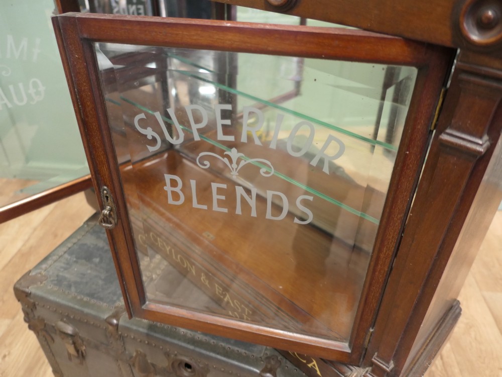 Victorian mahogany shop display cabinet featuring gilded signage reading Teas of the Empire and acid-etched glass doors. View IV