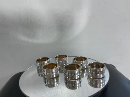 A Beautiful set of 6 Antique Miniature Solid Silver & Gilt Napkin Rings.
