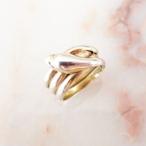 fig 1. An Art Deco silver ring designed as a coiled serpent wrapped tightly around the finger.