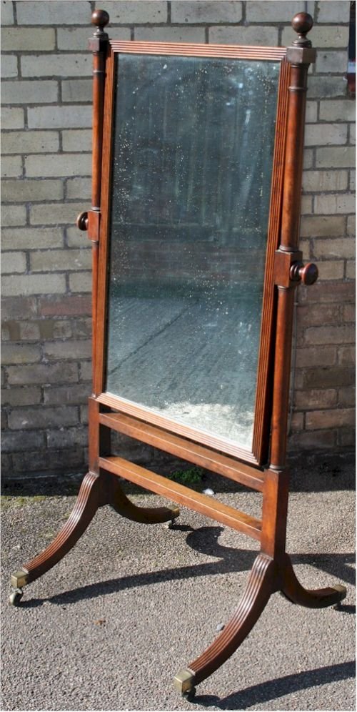 Regency Mahogany Cheval Mirror on Swept Reeded Legs.