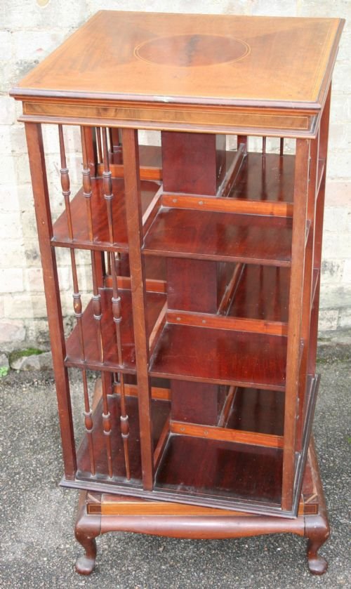 Edwardian Inlaid Mahogany Revolving Bookcase on Cabriole Leg Base.