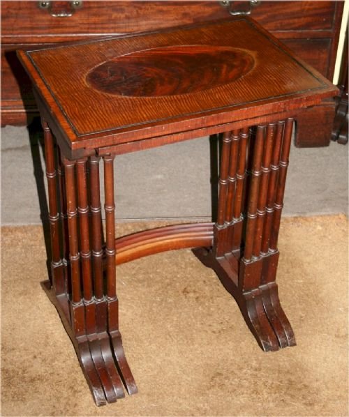 Edwardian Feathered Mahogany Nest of 4 Tables.