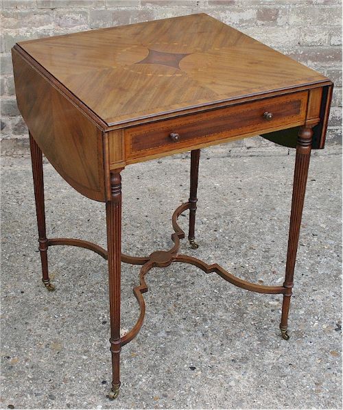 Edwardian Mahogany Inlaid Pembroke Table on Reeded Legs.