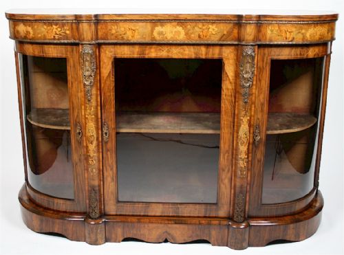 Victorian Figured Walnut 3 Door Bow End Credenza Having Floral Marquetry Inlays. 
