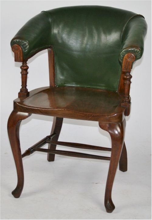 C1900. Mahogany Bow Back Desk Chair with Leather Upholstered Back and Arms.