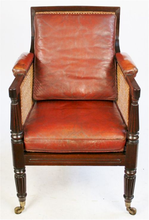 Regency Mahogany Bergere Armchair on Reeded Legs.