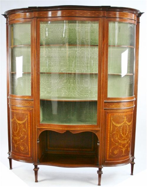 Edwardian Mahogany Inlaid Display Cabinet Having Serpentine Front and Bow Ends.
