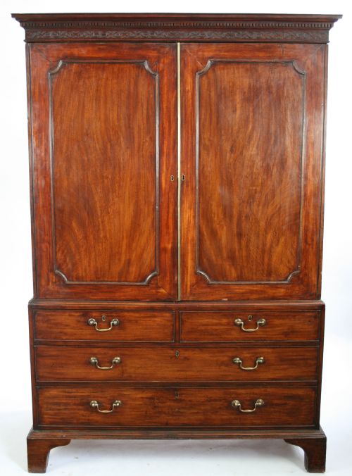 George 111 Mahogany Linen Press with Sliding Trays.
