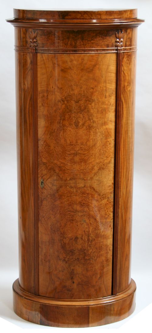 Mid 19c North European Figured Walnut Oval Pedestal Cupboard.