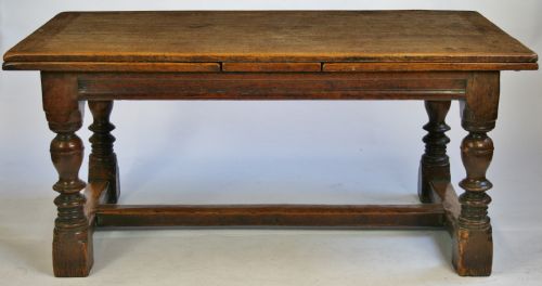 Early 20c Good Quality Solid Oak 17c Style Drawleaf Dining Table.