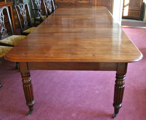 George 1v Mahogany Extending Dining Table with 4 Extra Leaves.