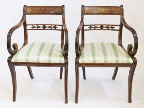 Regency Mahogany Pair of Elbow Chairs on Moulded Sabre Legs