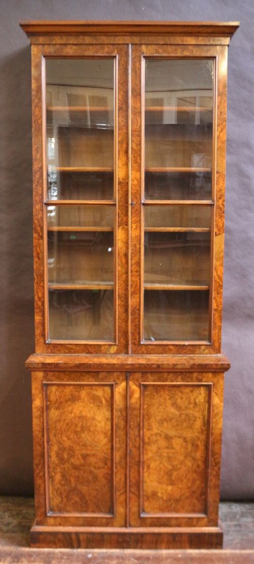 Fine Quality Victorian Figured Walnut Slim Cupboard Base Bookcase.