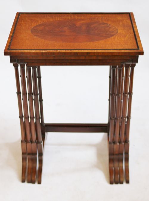 Edwardian Feathered Mahogany Nest of 4 Tables