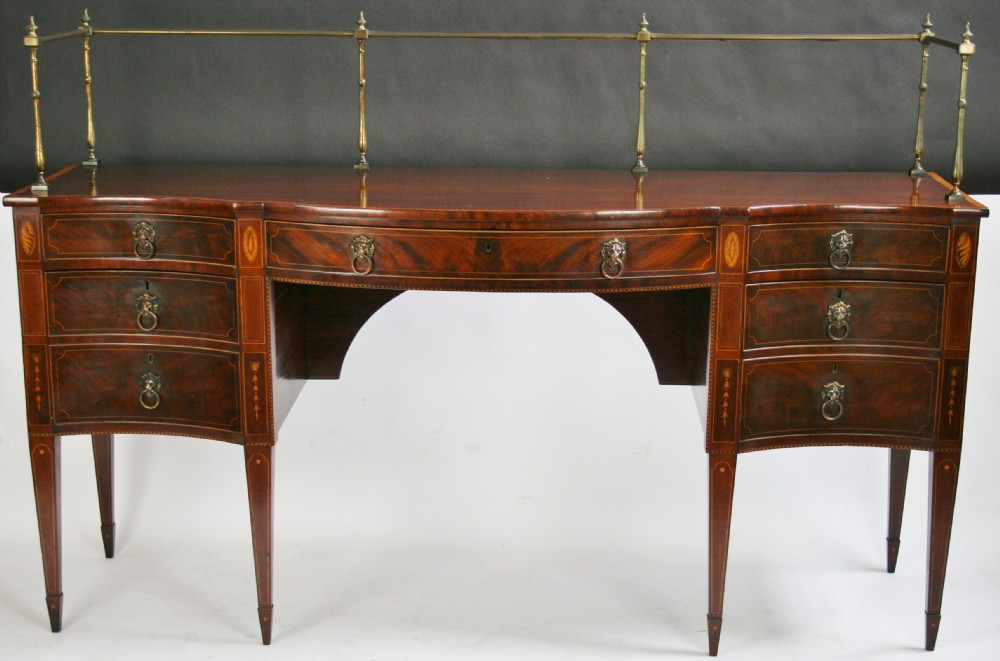George 111 Inlaid Mahogany Serpentine Sideboard.