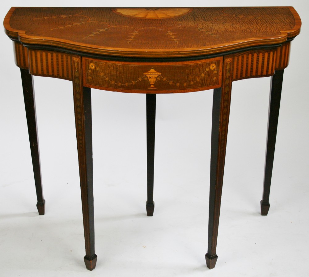 Edwardian Inlaid Feathered Mahogany Shaped Card Table.