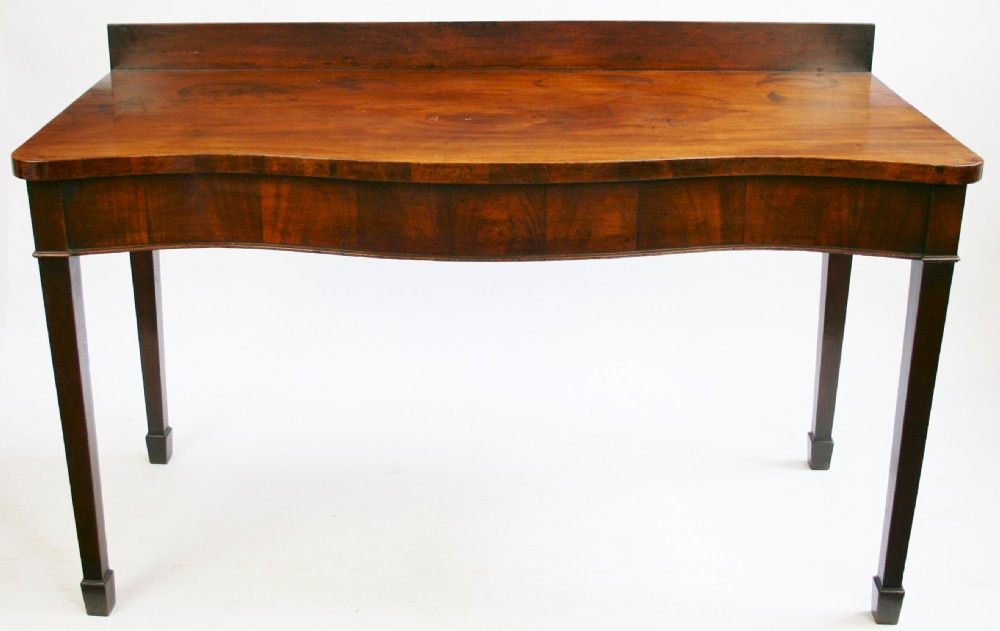 George 111 Mahogany Serpentine Serving Table.