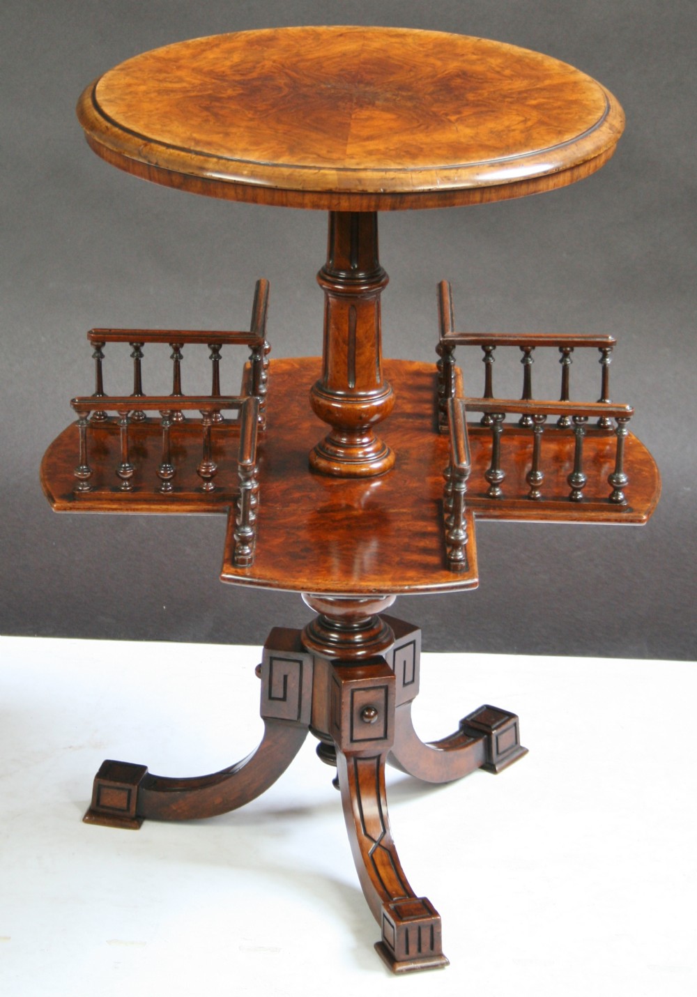 Victorian Figured Walnut Pedestal Tripod Book Table.