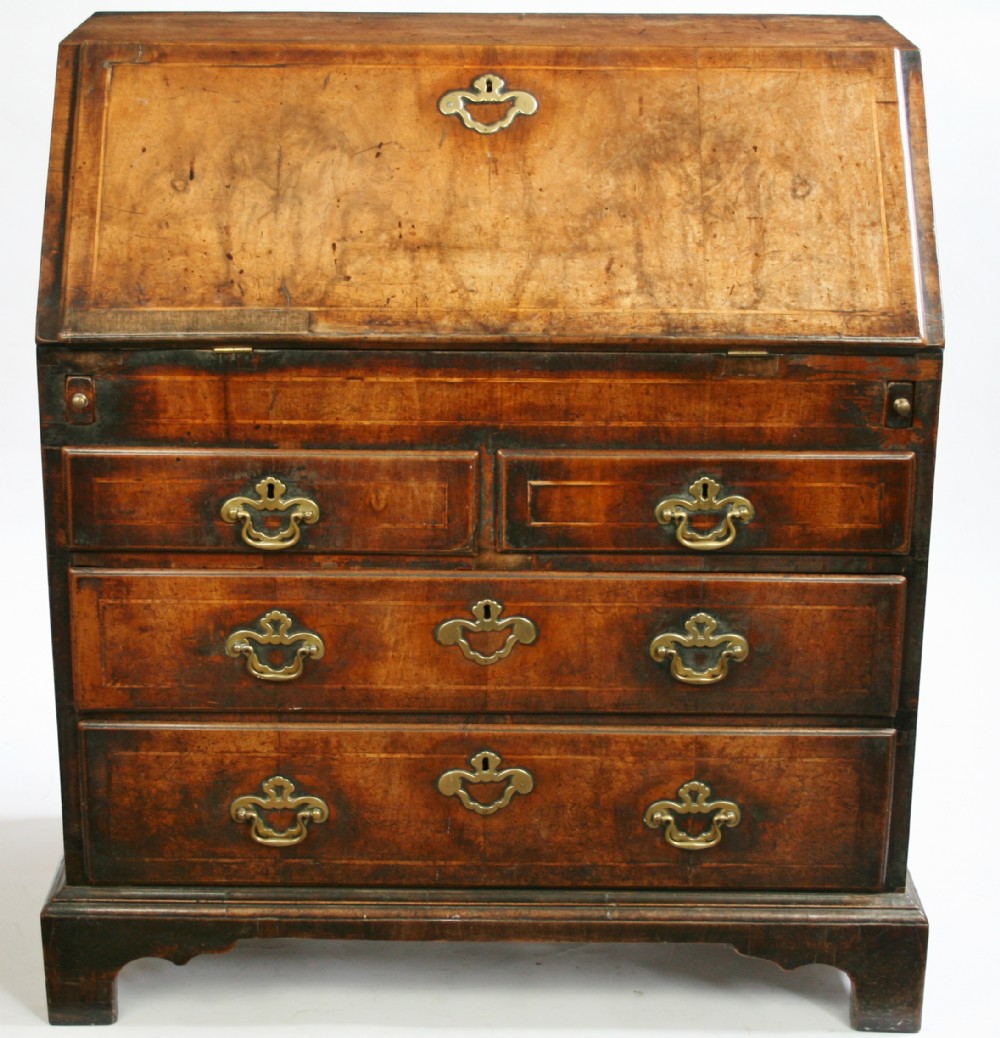 George 11 Figured Walnut 3' Bureau.