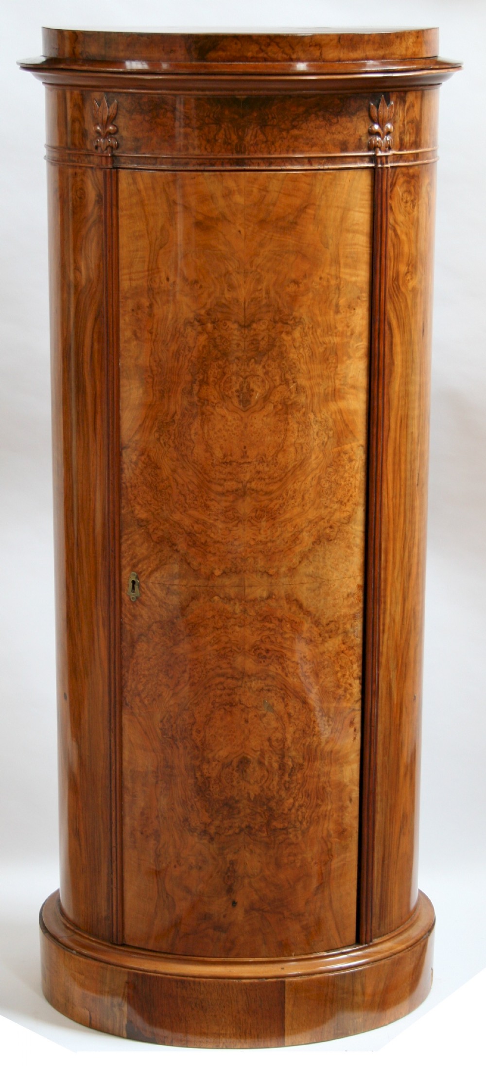 Mid 19C North European Figured Walnut Oval Pedestal Cupboard.