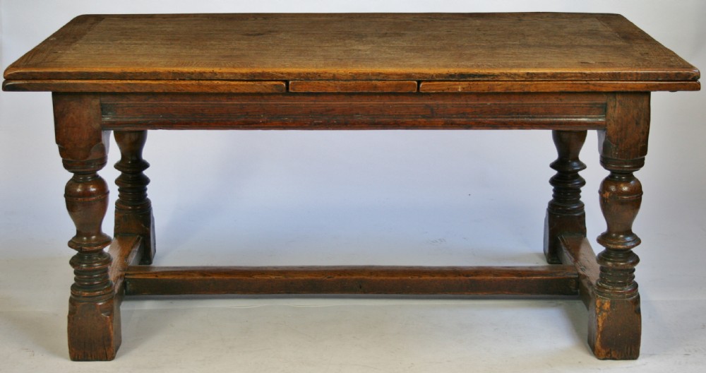 Early 20C Good Quality Solid Oak 17C Style Drawleaf Dining Table.