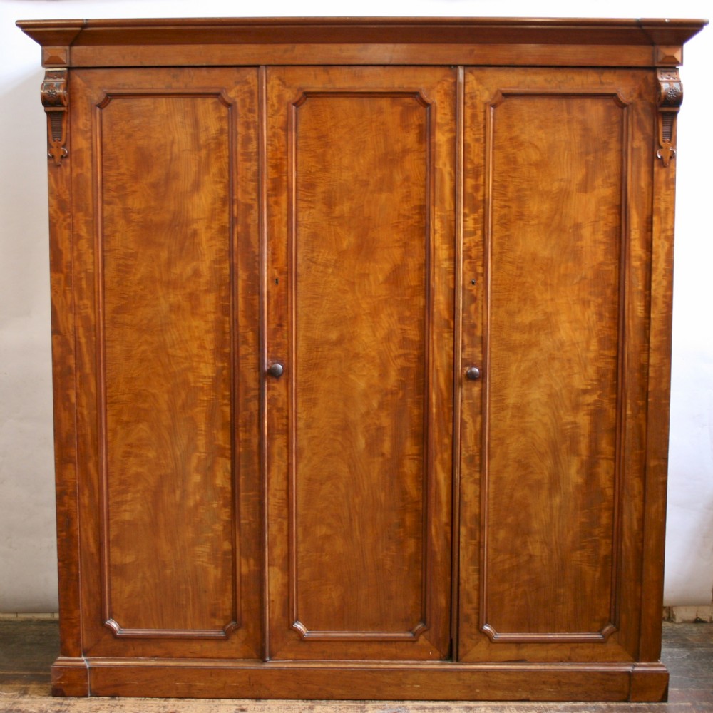 A Fine Quality Figured Mahogany 3 Door Wardrobe