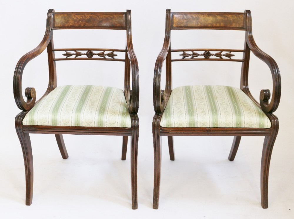 Regency Mahogany Pair of Elbow Chairs on Moulded Sabre Legs