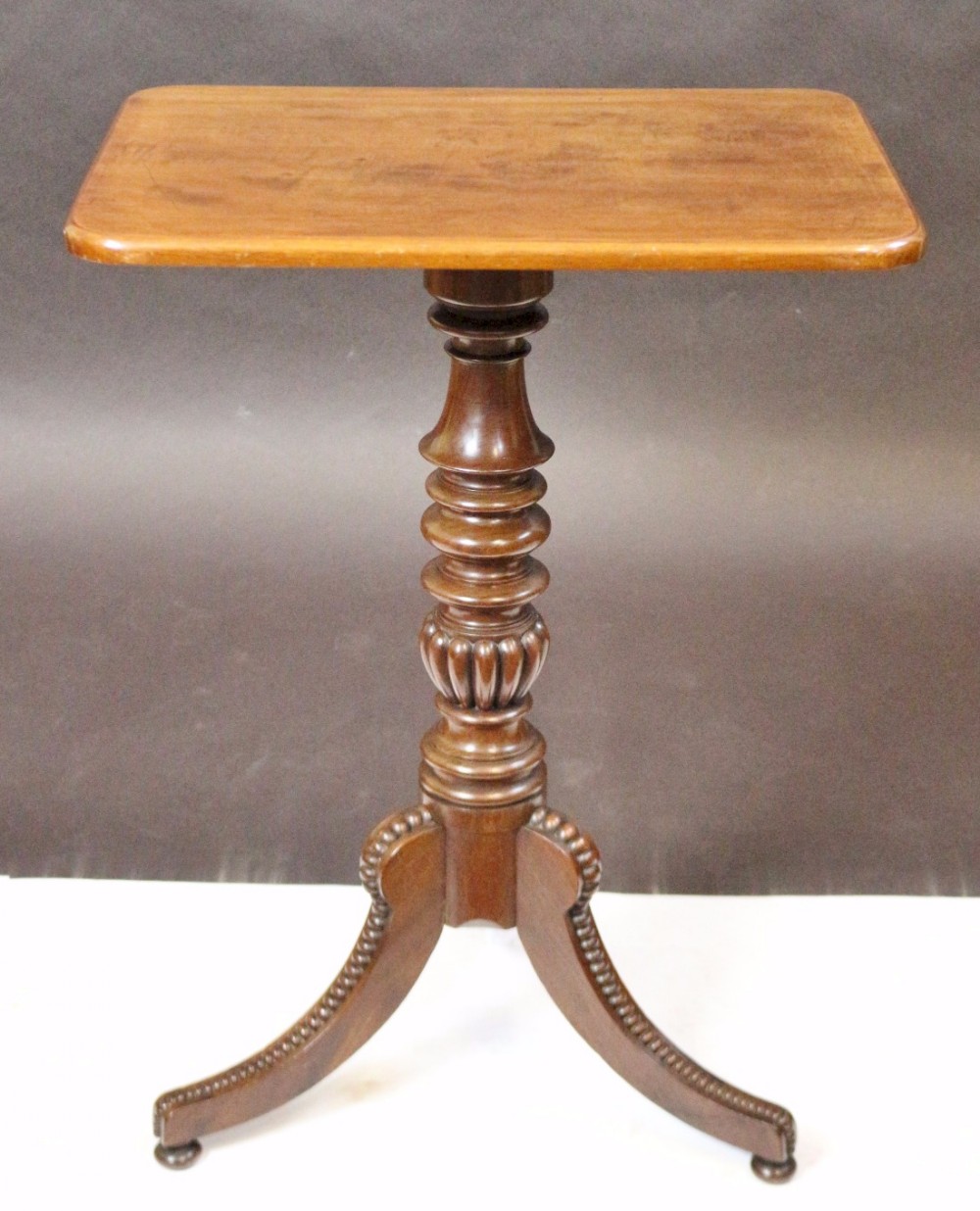 George 1V Mahogany Oblong Tripod Wine Table in the  manner of Gillows.