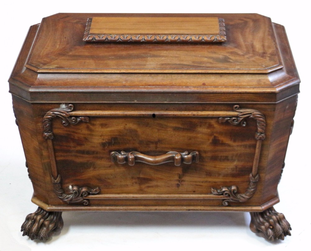 A Fine William 1V Mahogany Sarcophagus Wine Cooler with Carved Decoration