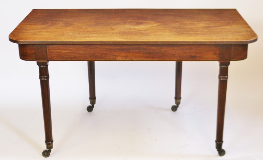 George 111 Mahogany 'Imperial' Action Extending Dining Table with 3 Extra Leaves.  View IV