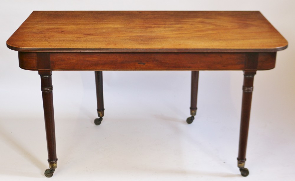 George 111 Mahogany 'Imperial' Action Extending Dining Table with 3 Extra Leaves.  View V