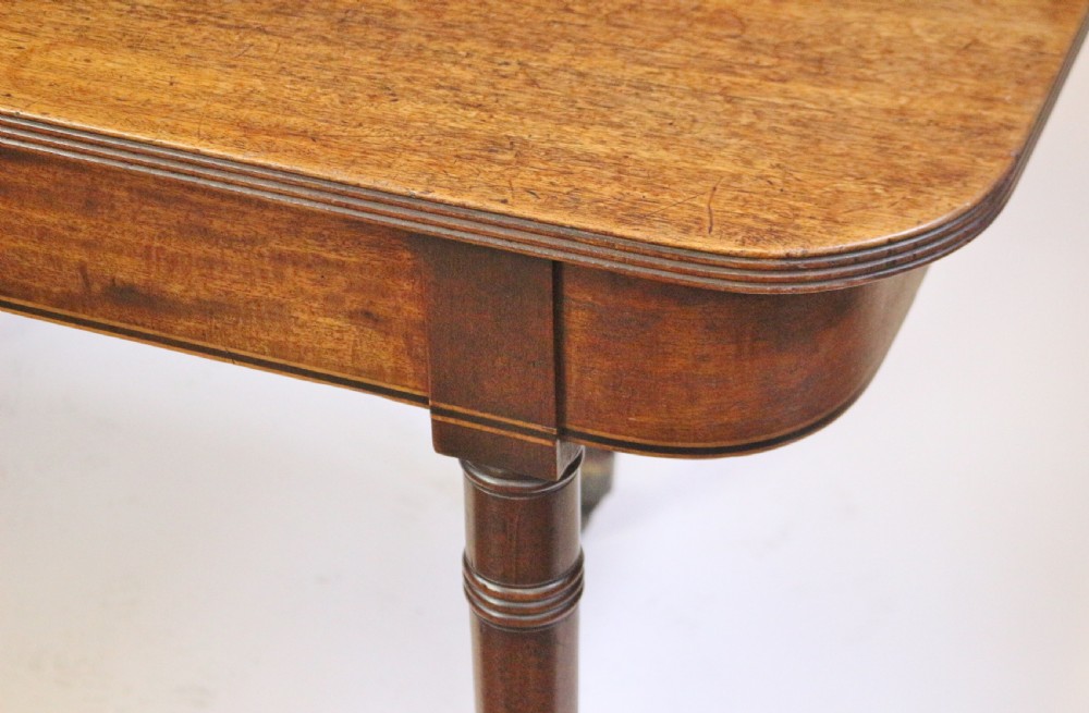 George 111 Mahogany 'Imperial' Action Extending Dining Table with 3 Extra Leaves.  View XIV