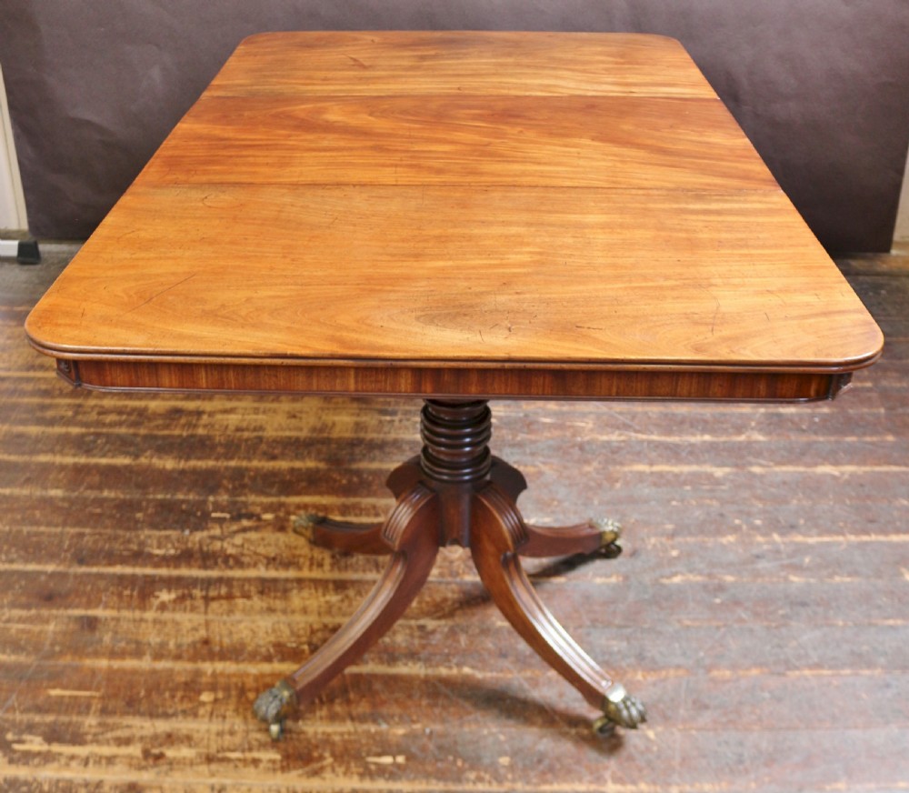 A Fine Regency Mahogany 2 Pillar Dining Table with Extra Leaf View II