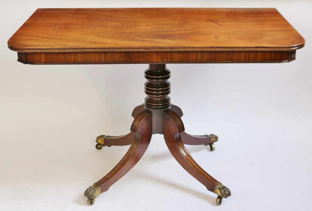 A Fine Regency Mahogany 2 Pillar Dining Table with Extra Leaf View VII