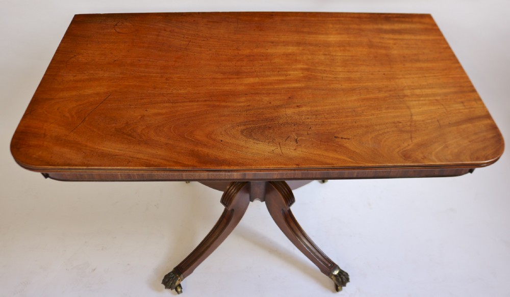 A Fine Regency Mahogany 2 Pillar Dining Table with Extra Leaf View IX
