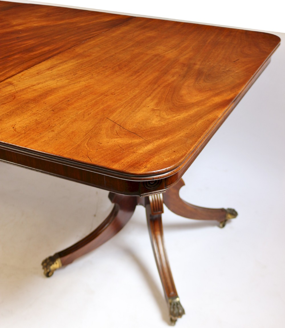 A Fine Regency Mahogany 2 Pillar Dining Table with Extra Leaf View XII